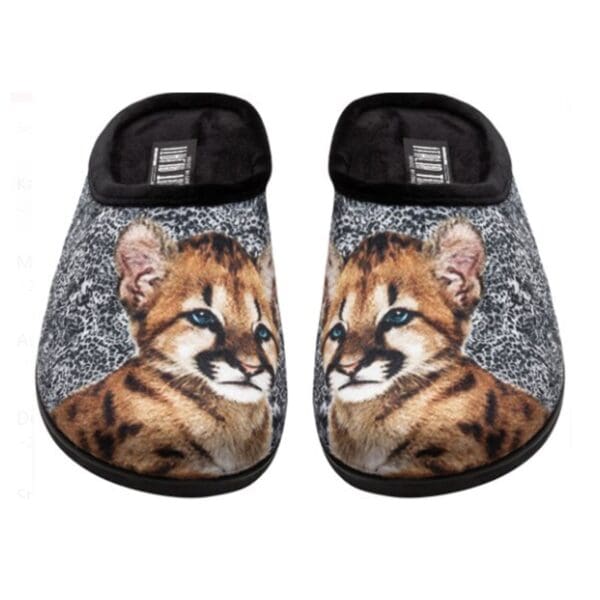 A pair of slippers with a picture of a cat.